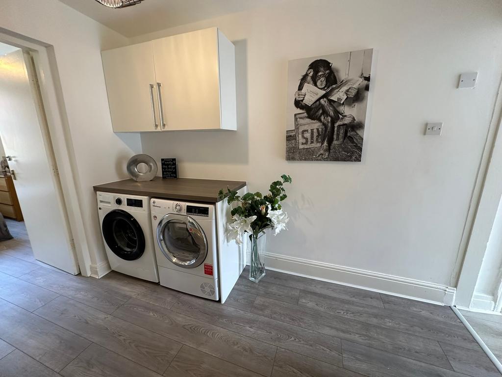 This well-appointed kitchen features modern app...