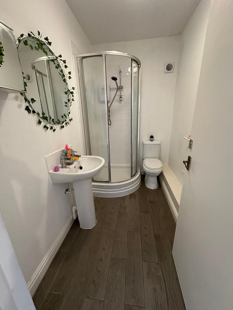 A bright and modern bathroom featuring a sleek ...