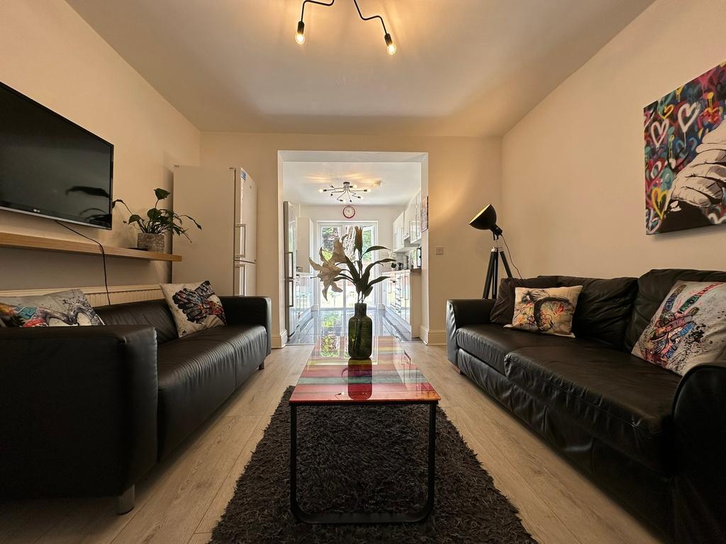 A stylish and welcoming living room featuring c...