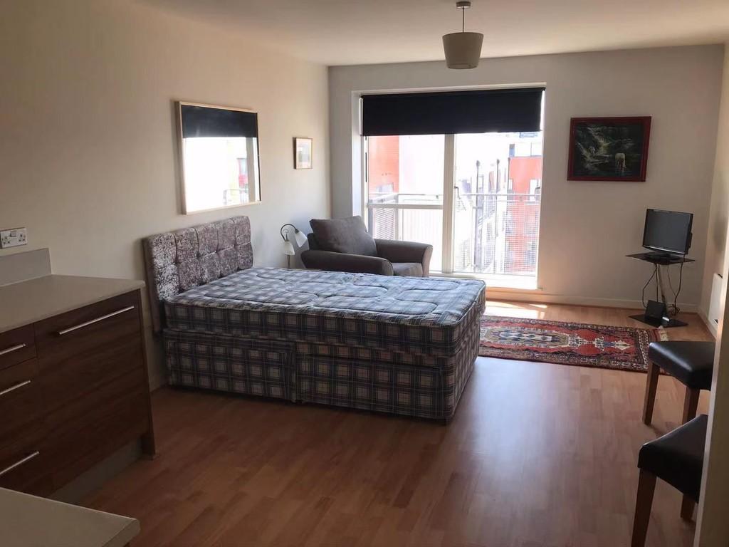 Bed with view of window and balcony v2