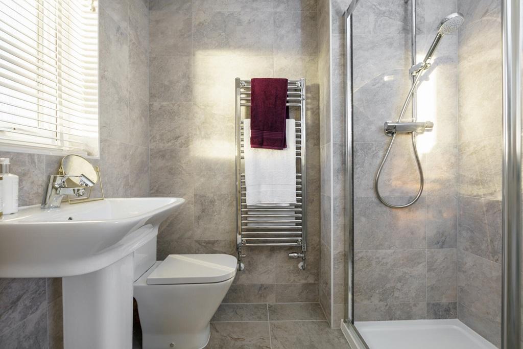 An en suite shower room away from the family