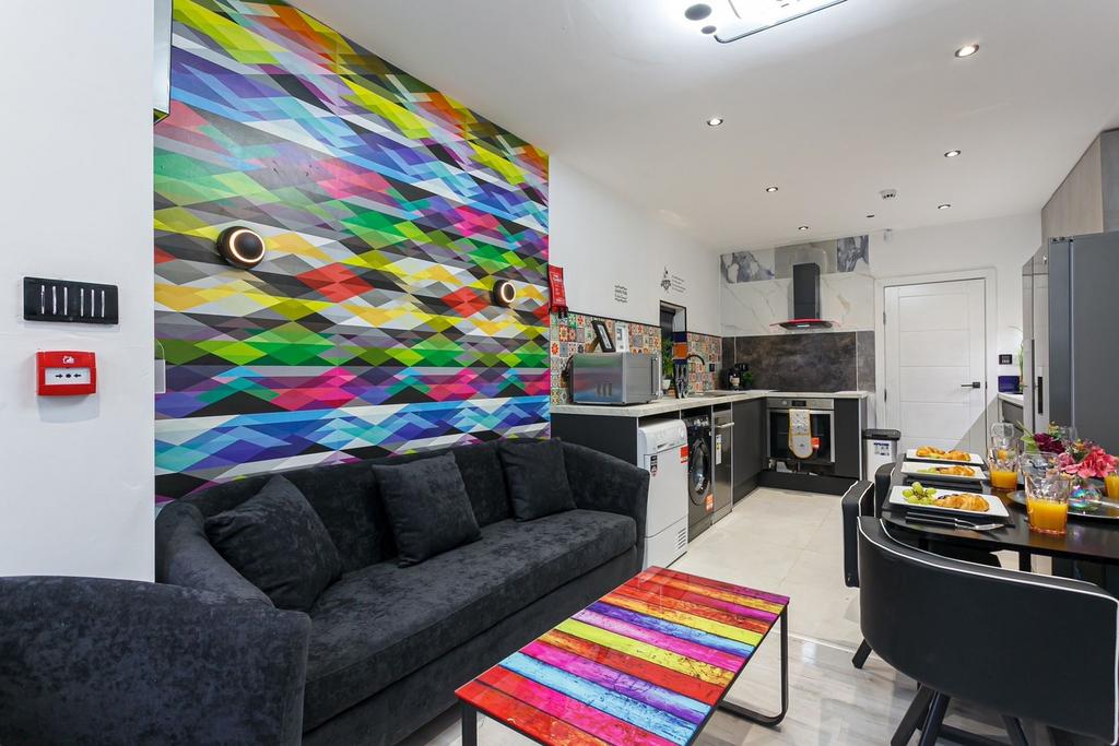 A vibrant and modern kitchen with stylish decor...