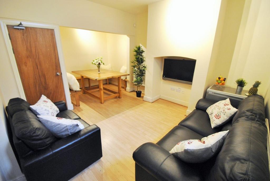 A cozy living room featuring comfortable seatin...