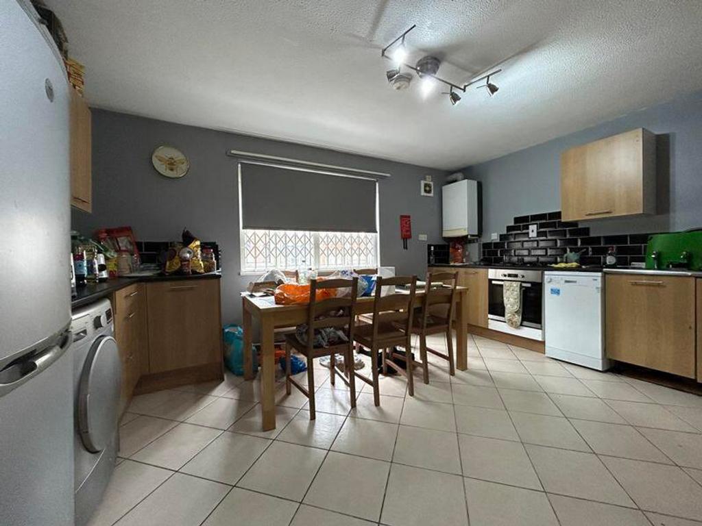 A spacious and bright kitchen area, perfect for...