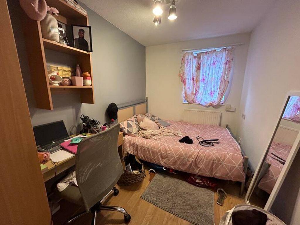 A cozy double bedroom with natural light, perfe...