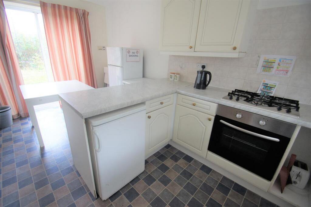 This charming kitchen features ample counter sp...