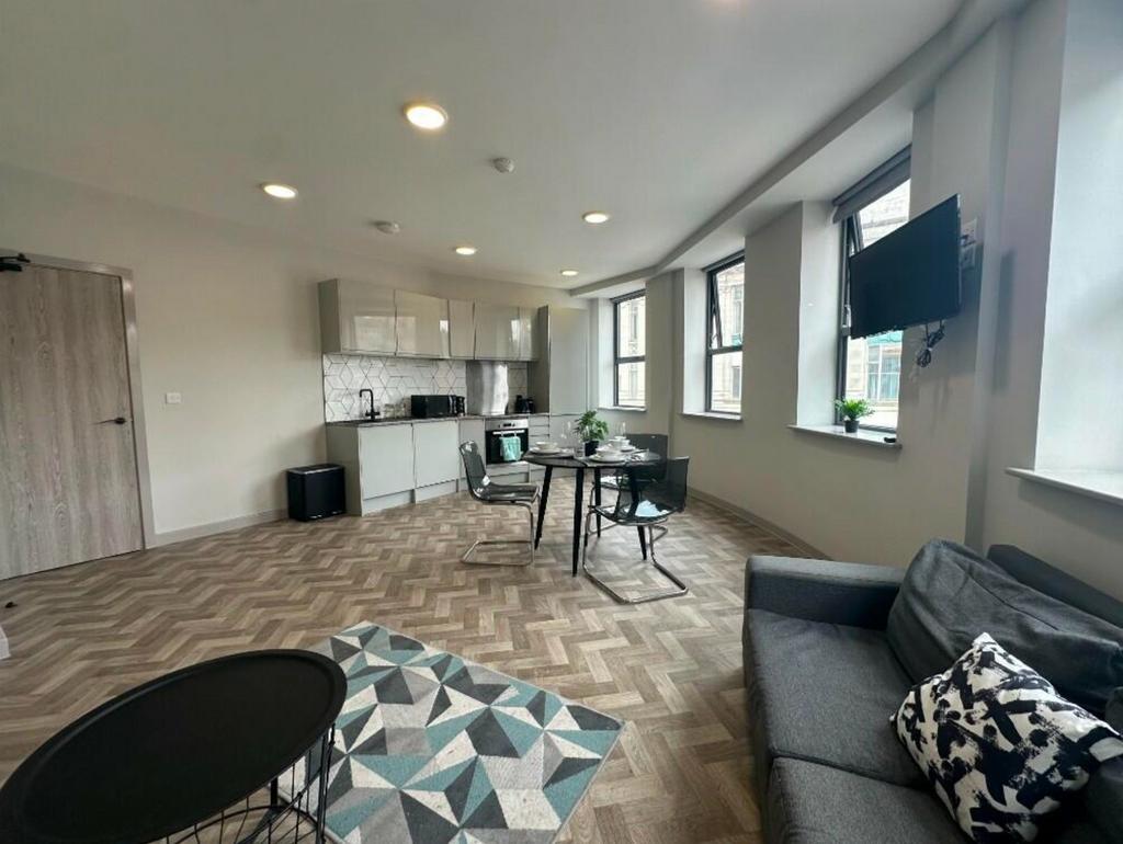 A spacious and modern living room filled with n...