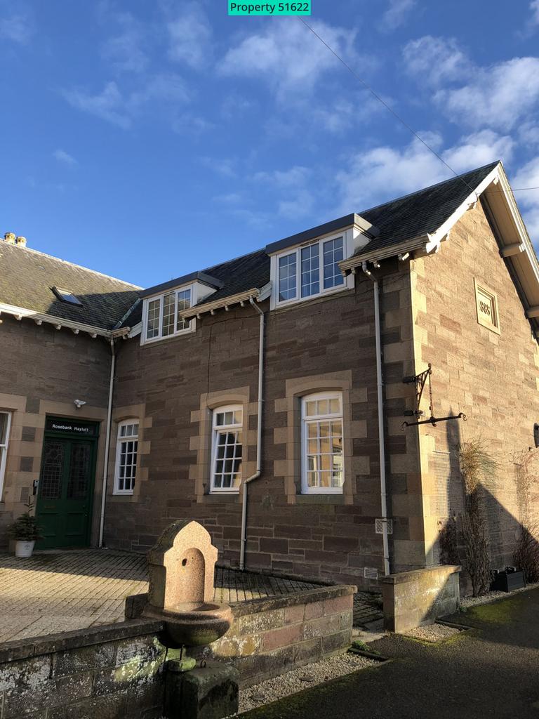 Private entrance leading to top level flat