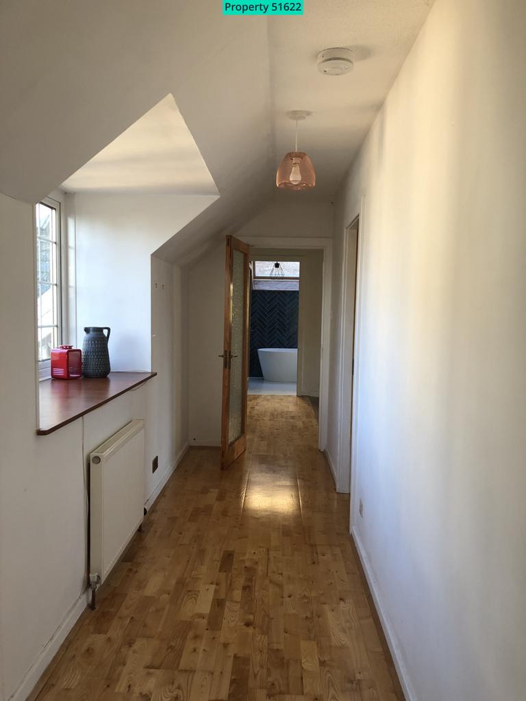 Hallway facing main bathroom