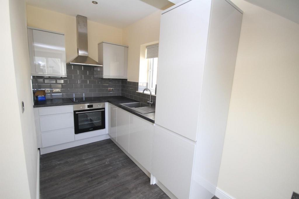Photo shown may be of another apartment in same de
