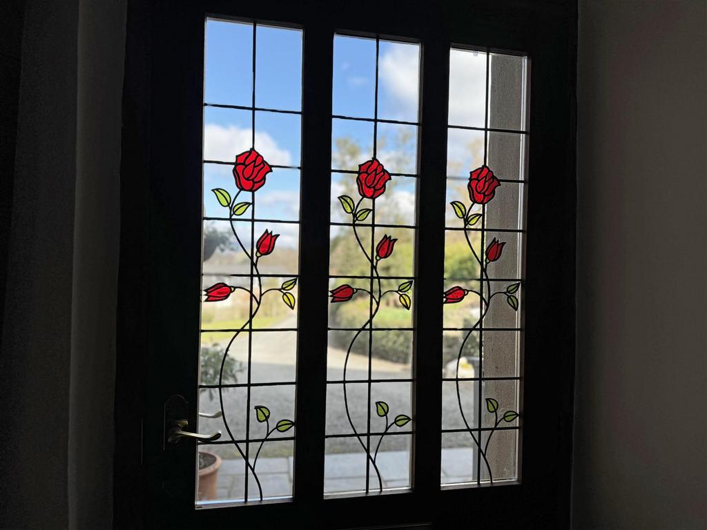 Half glazed entrance door to