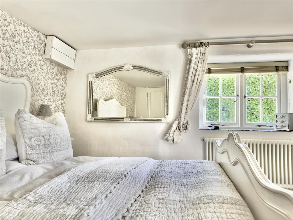 COTTAGE BEDROOM ONE.jpeg