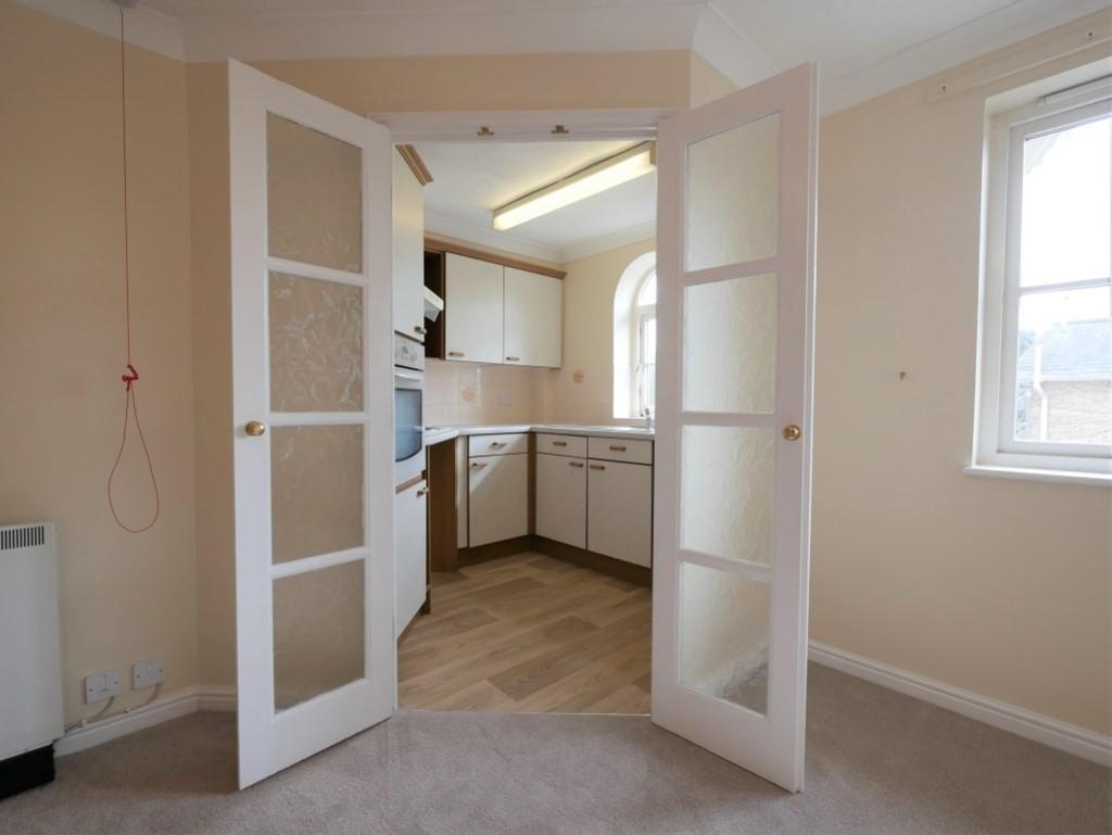 Opening to kitchen