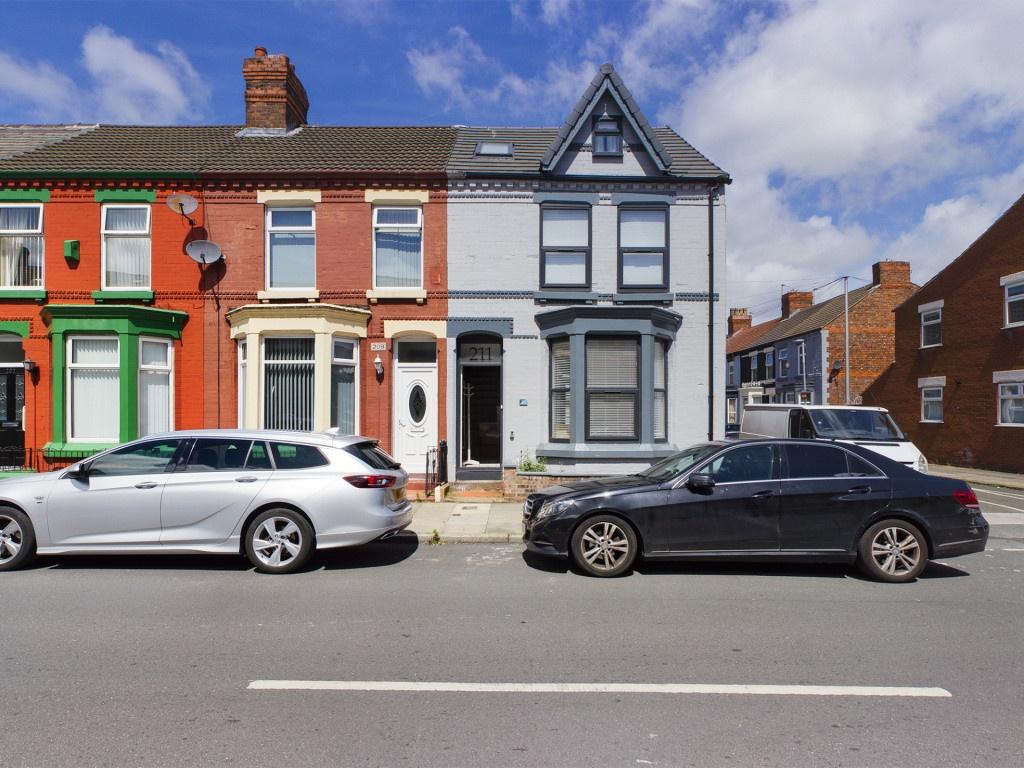 A charming row of terraced houses with colorful...