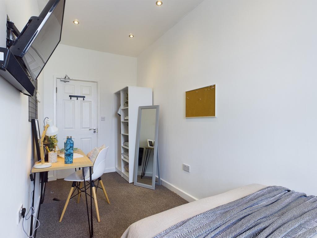 A bright and inviting double bedroom, perfect f...