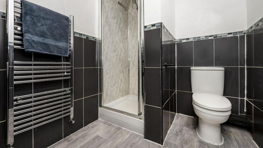 A modern and well-maintained bathroom featuring...