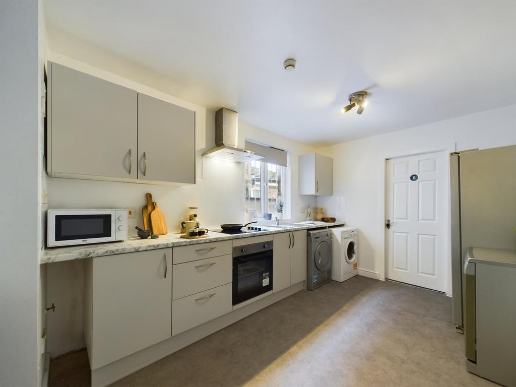 A modern and well-equipped kitchenette, perfect...