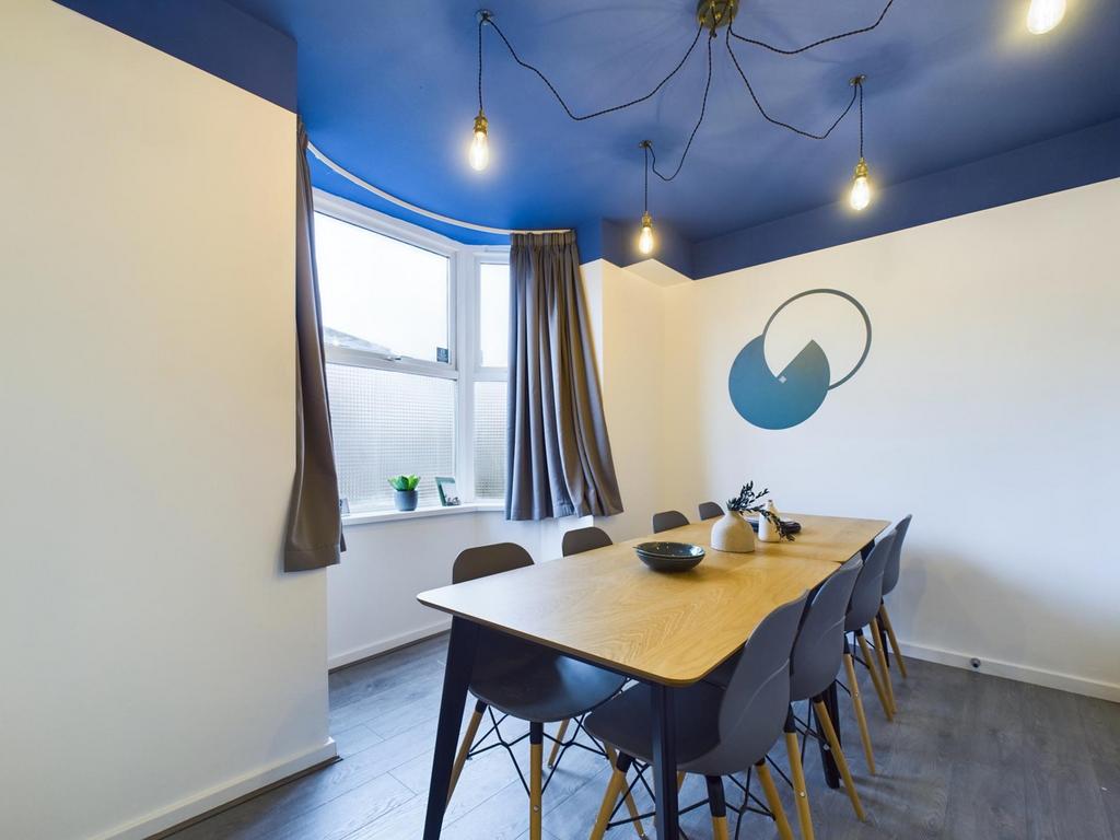 A modern and inviting communal workspace, perfe...