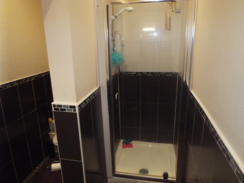 Bright and modern bathroom featuring a spacious...