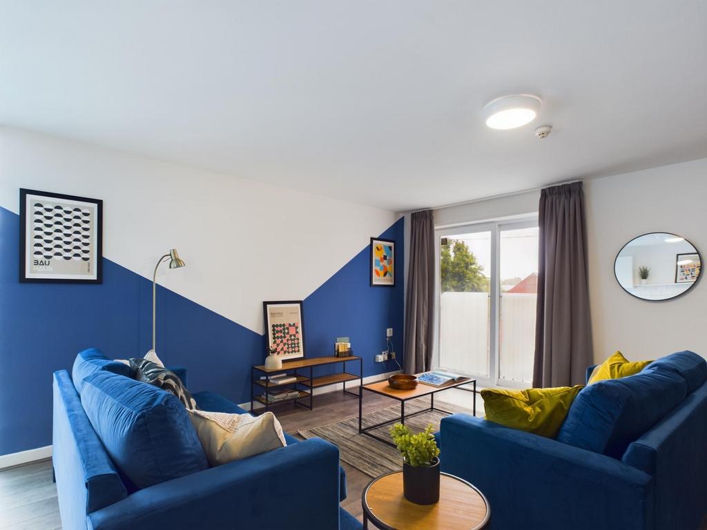 A spacious and inviting large modern living roo...
