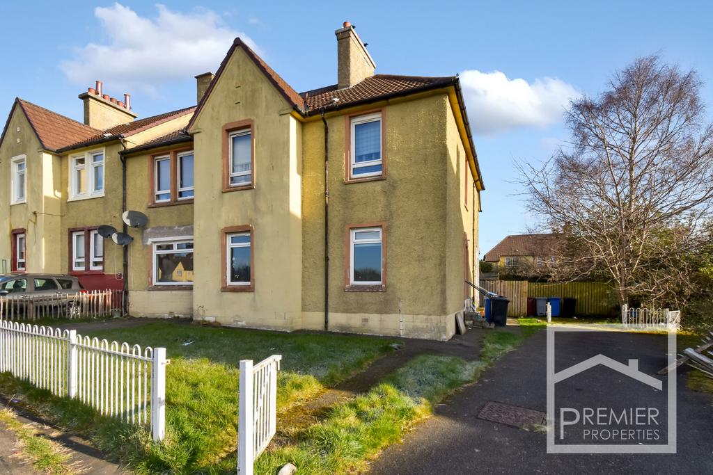 A three bedroom main door garden flat