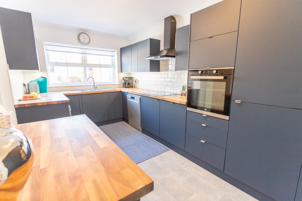 Modern Kitchen with doors to Dining Room