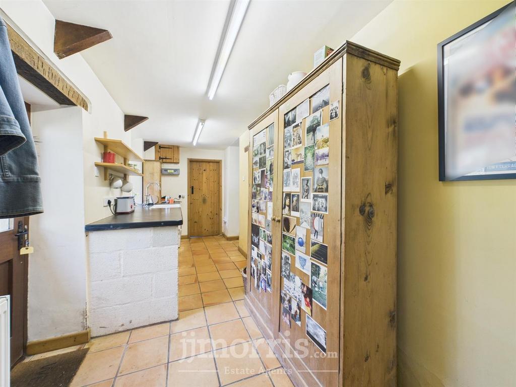 Hardwood Entrance Door to:-