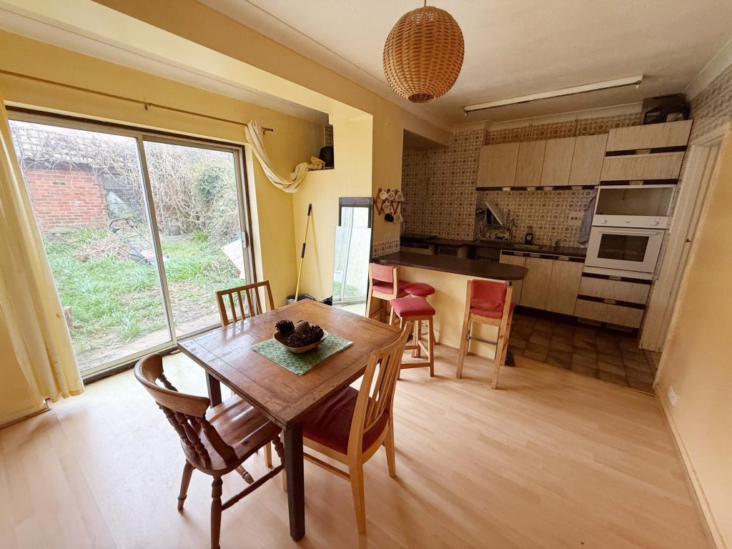 Kitchen and Dining Area with patio doors to rear g