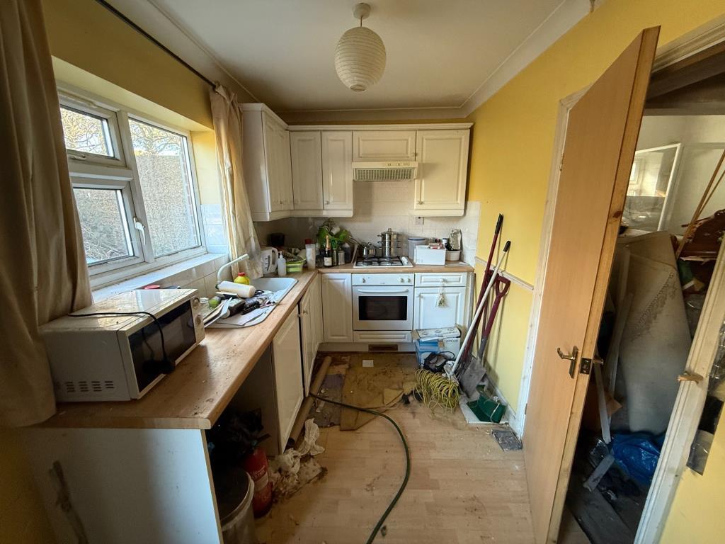 Kitchen area with window to the rear