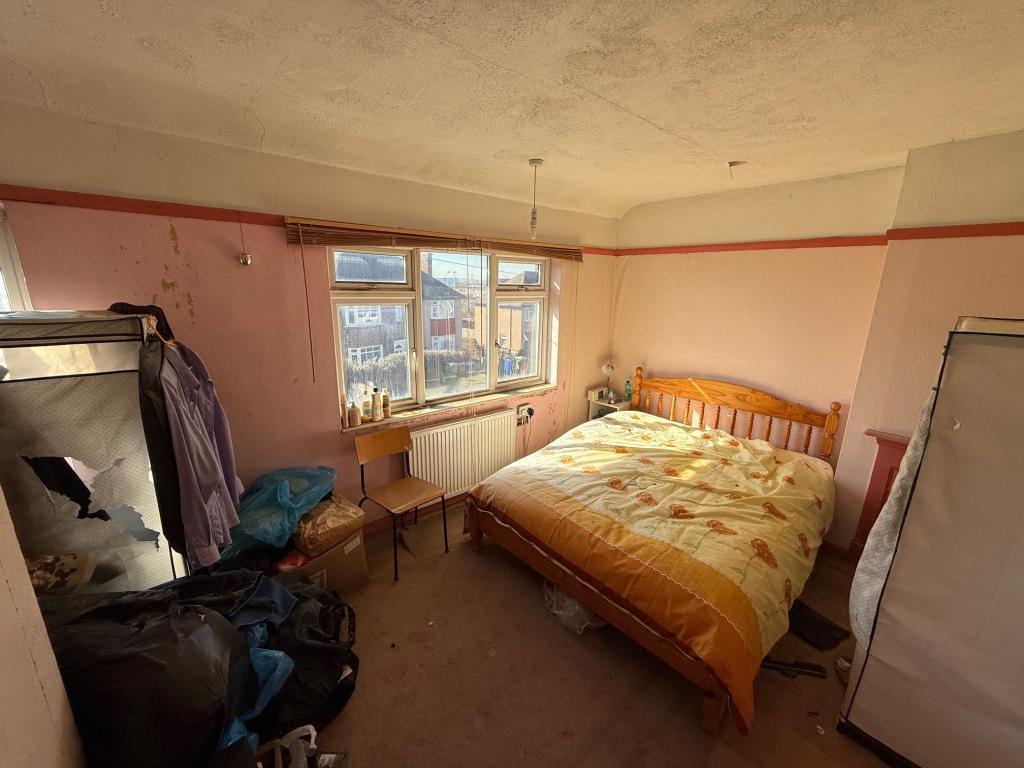Bedroom 1 with two windows to the front and views