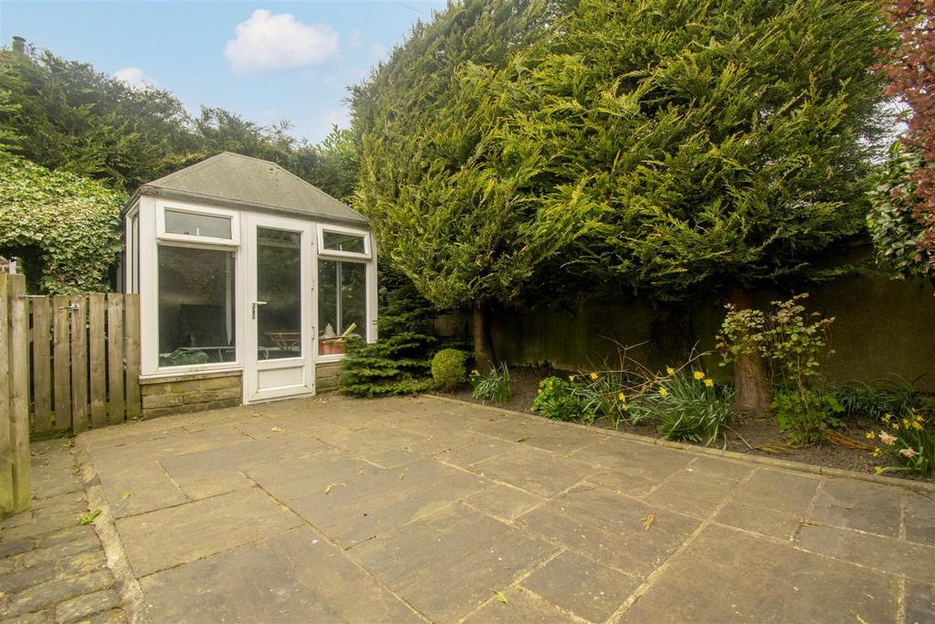 Patio area leading to sunroom