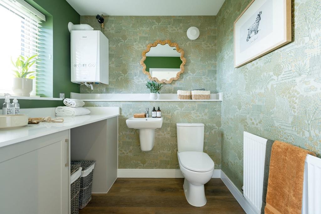 A downstairs cloakroom and utility adds...