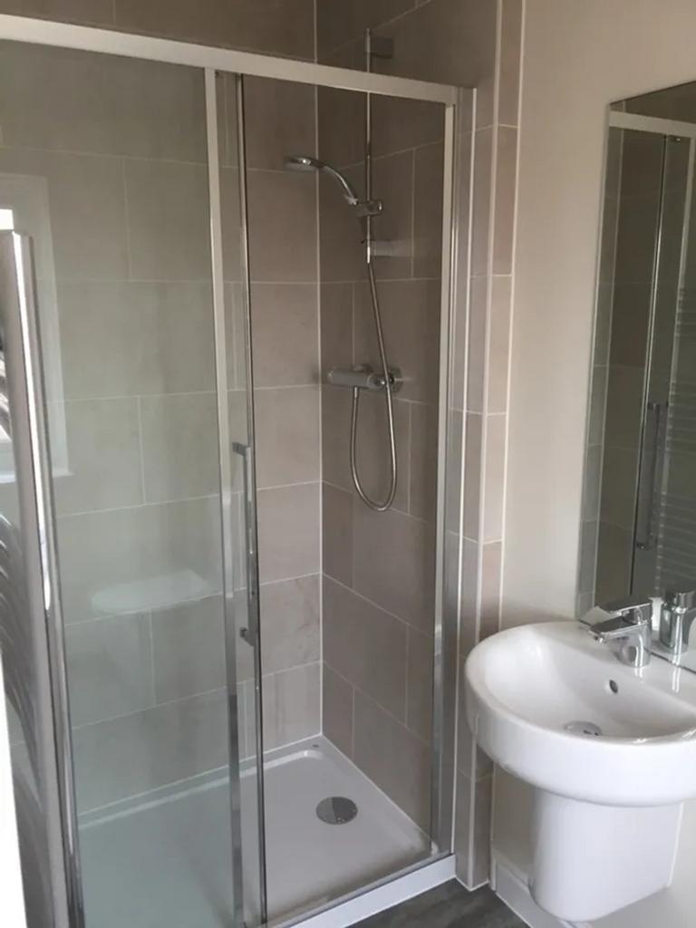 A modern and well-maintained bathroom featuring...