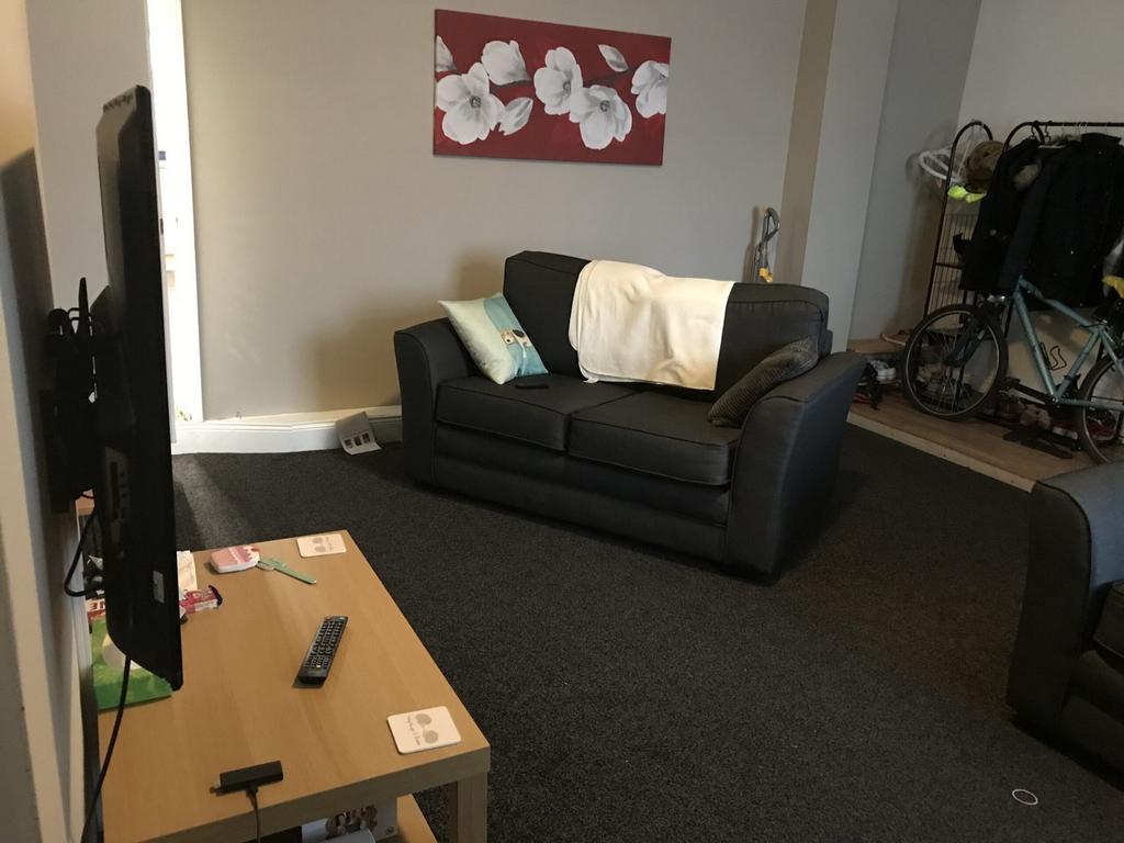 A cozy living room featuring comfortable seatin...