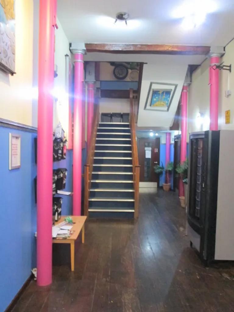 A vibrant and welcoming hallway with colorful a...