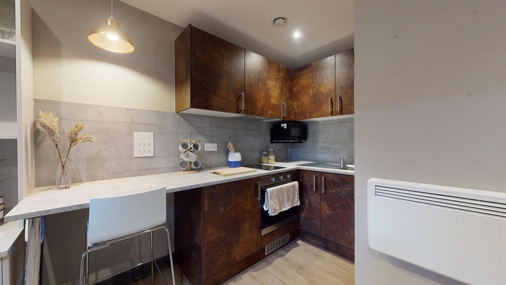 A modern and tidy kitchenette featuring stylish...