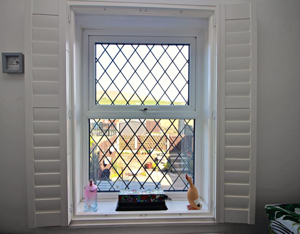 Rear Window with Shutters