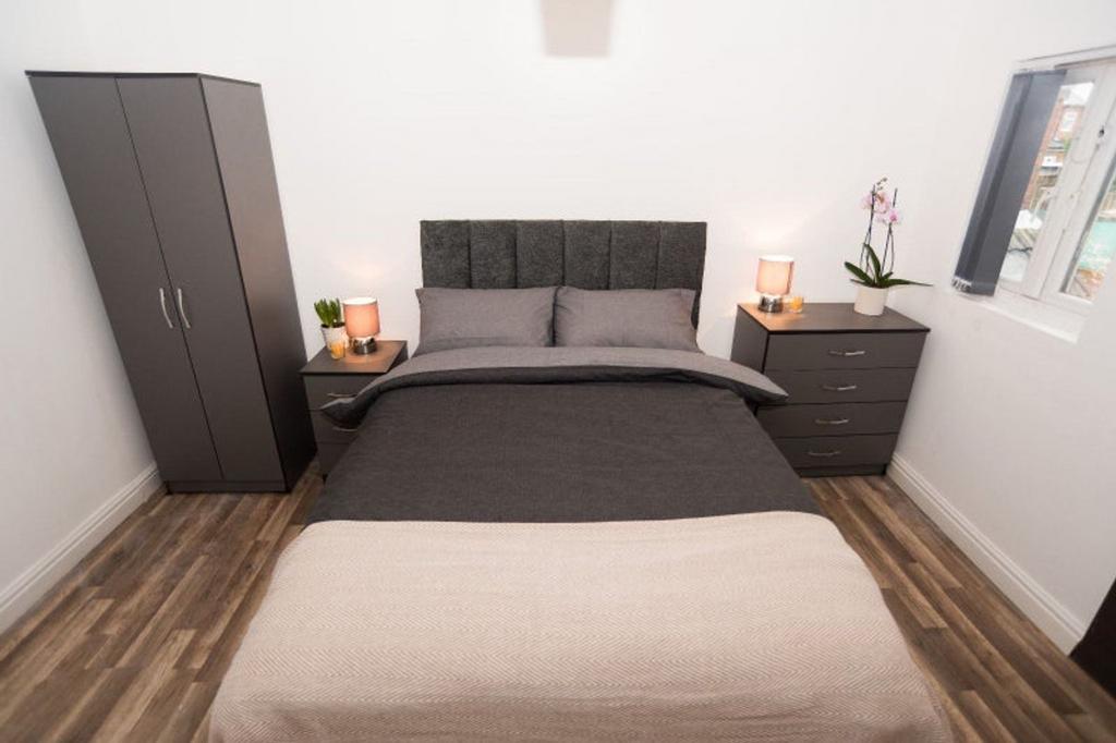 This beautifully styled double bedroom features...