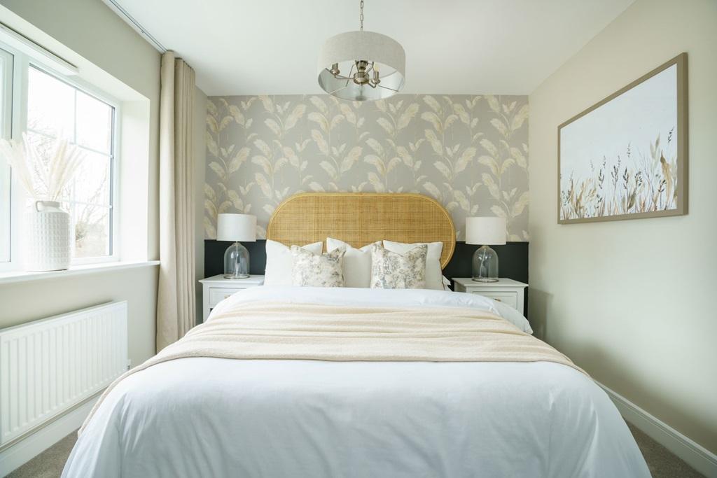 The main bedroom includes an en-suite bathroom