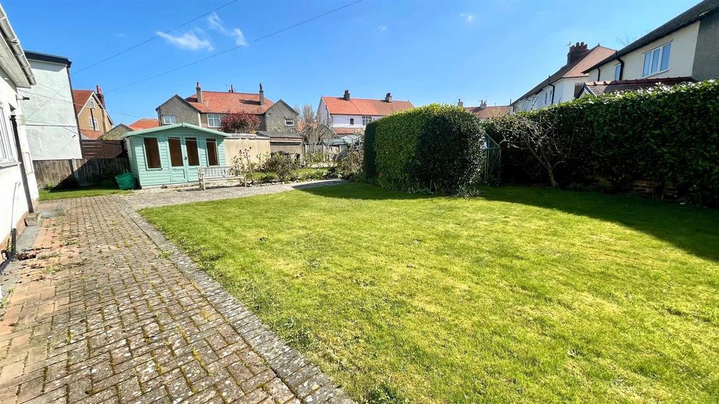 Side and rear garden