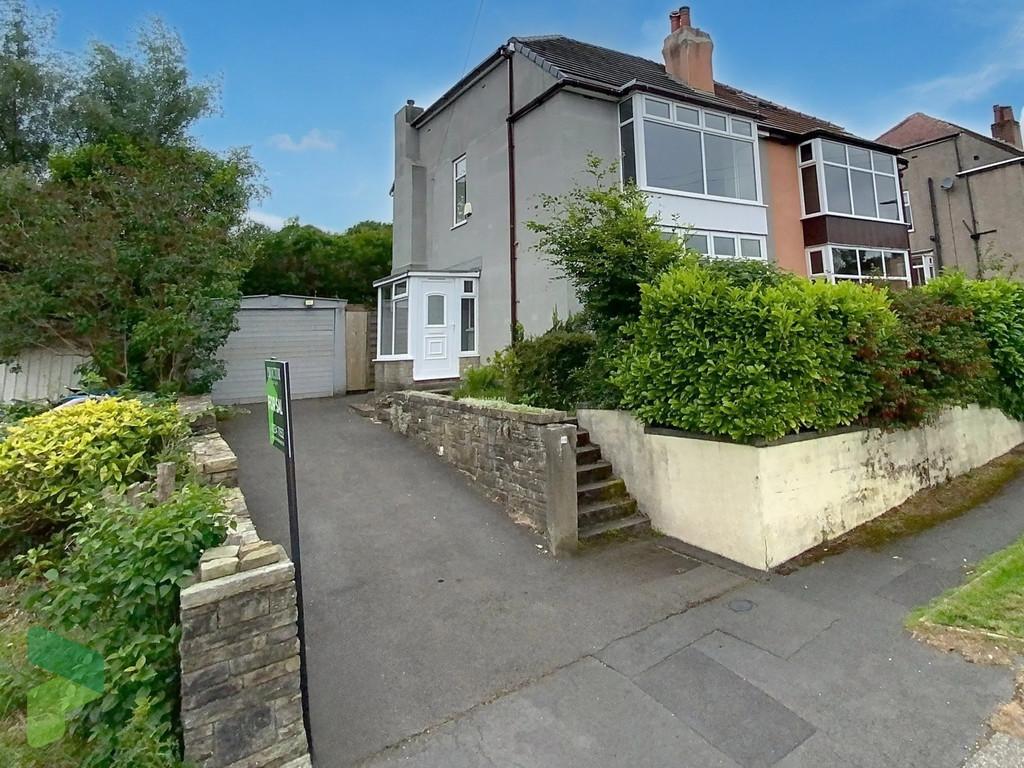 Front Exterior, Garage and Driveway