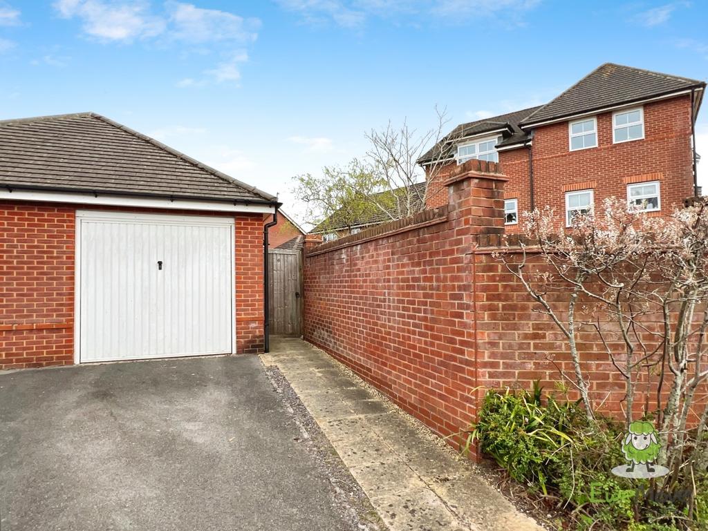 Rear Garage and Driveway