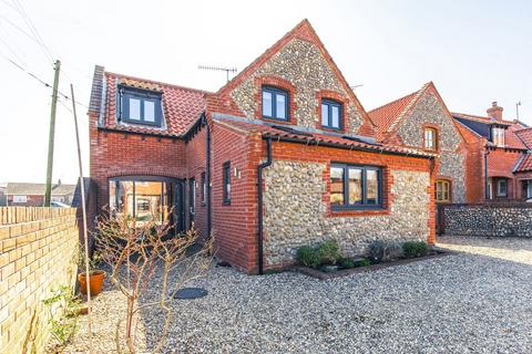 3 bedroom cottage for sale, A stunning brick-and-flint retreat nestled in the heart of the charming coastal village of Weybourne.