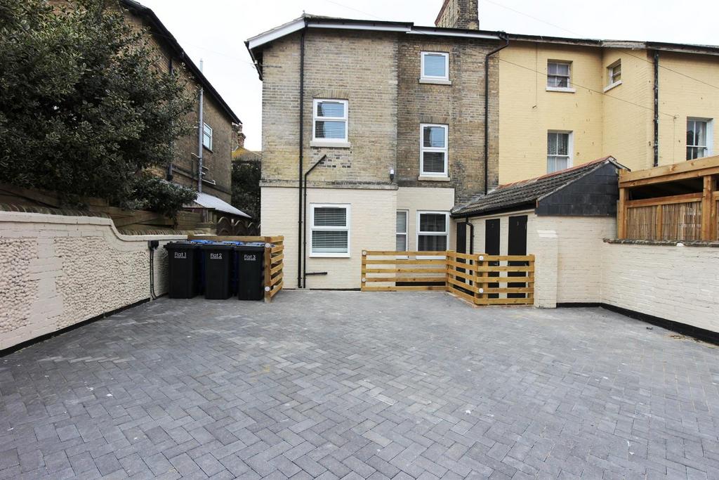Outside to rear