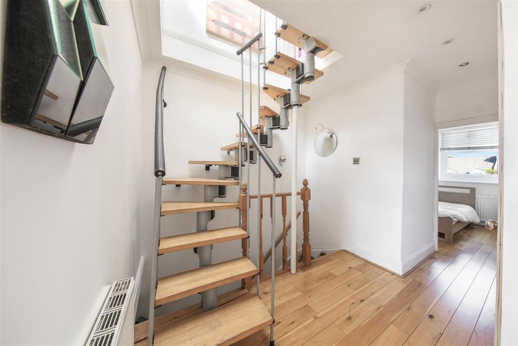 Entrance hall with stairs toupper floor