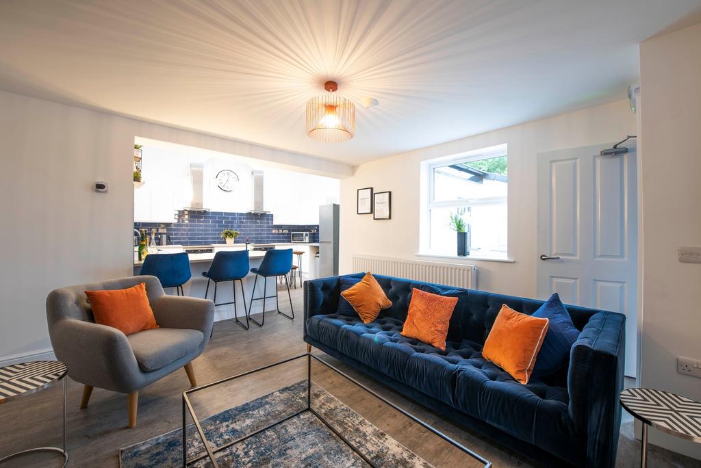 Enjoy a spacious and inviting living room, perf...