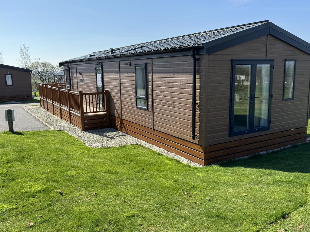 View from Rear showing parking for 2 cars