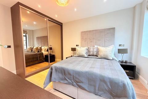 Flat 2, 88 Portland Place, London, W1B 1NX