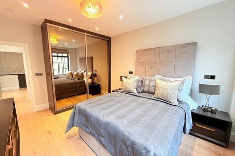 Flat 2, 88 Portland Place, London, W1B 1NX