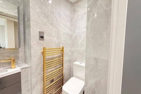 Flat 2, 88 Portland Place, London, W1B 1NX